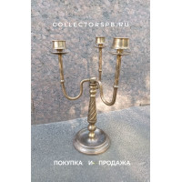  Подсвечник на три свечи. Бронза. Высота: 32 см.