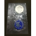 Монета 1 доллар 1972 год и жетон. США. Серебро. В родной упаковке.